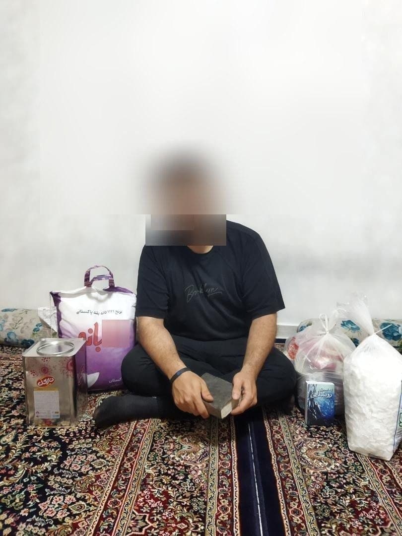 A brother preparing food baskets (anonymized)